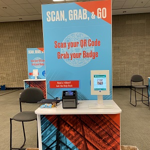 Blue and orange scan and go registration station