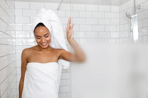 woman in shower with graduated privacy glass