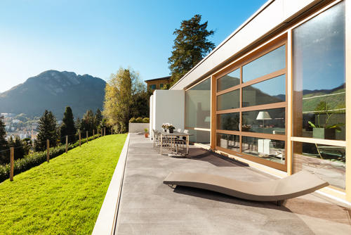 patio, window wall and view of mountain
